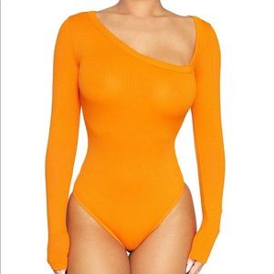 The NW solid asymmetrical bodysuit
